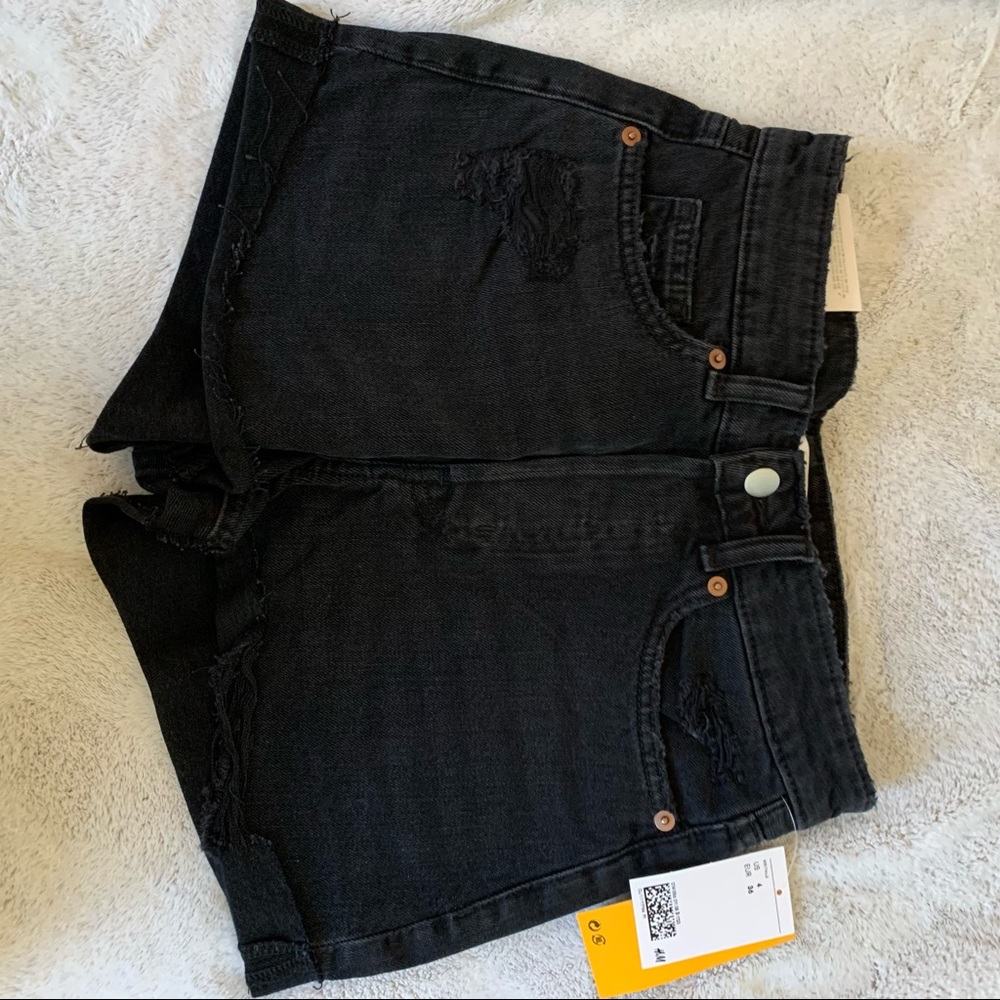 HM black ripped shorts
